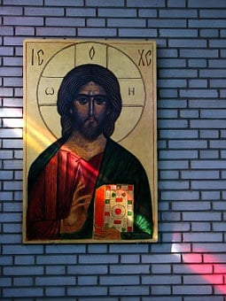 Jeesus ikoni tiiliseinällä